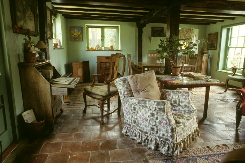 The Sitting Room at Monk's House showing the green paint liked by Virginia Woolf.
